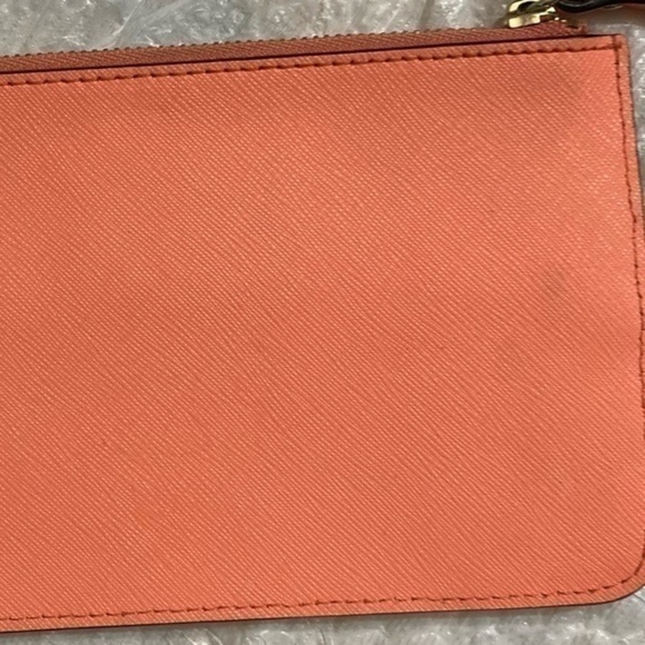 Kate spade peach saffiano leather wristlet bag